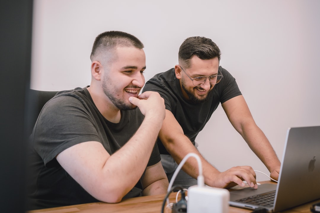 Smiling marketing team working together in a bright office